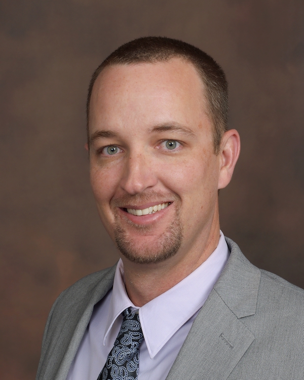 headshot of Chris Lewis